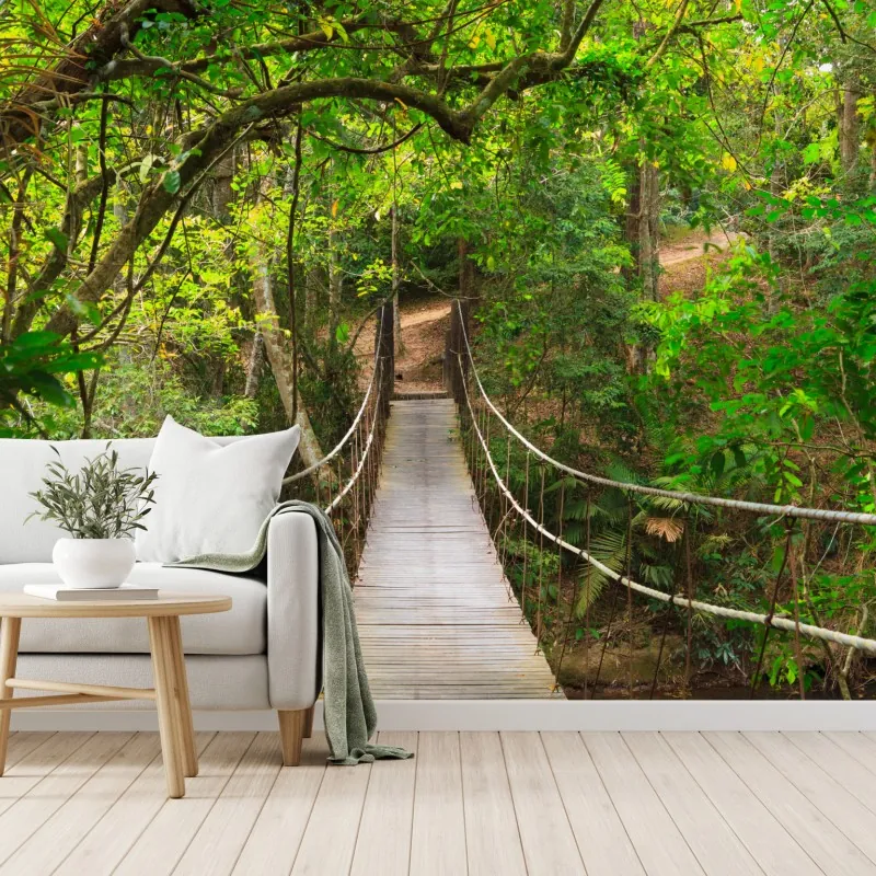 Wall mural suspended forest footbridge through green canopy