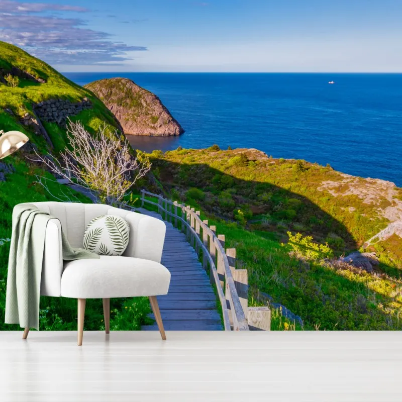 Wall mural coastal boardwalk overlooking blue ocean