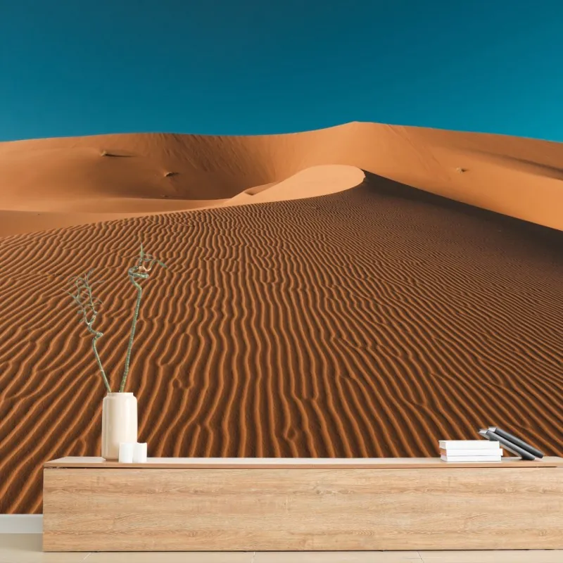 Wall mural golden sand dunes under deep blue sky