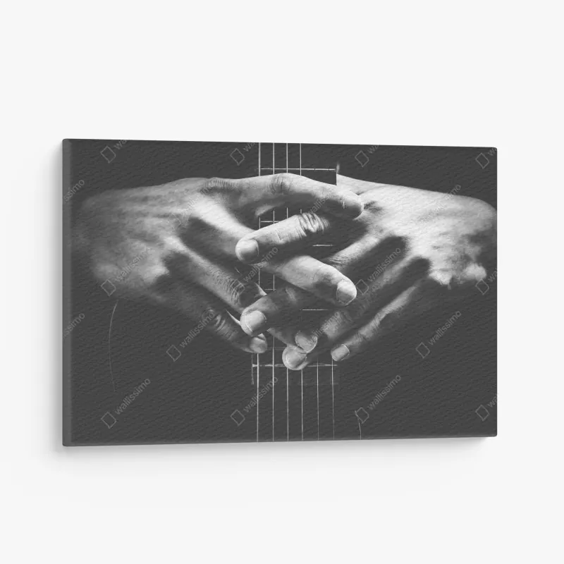 Obraz na płótnie splątane ręce na strunach gitary