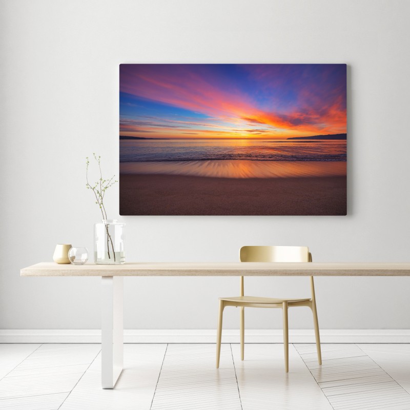 Obraz na płótnie żywy wschód słońca nad spokojną plażą – Wallissimo® Obraz na płótnie żywy wschód słońca nad spokojną plażą – Wallissimo®