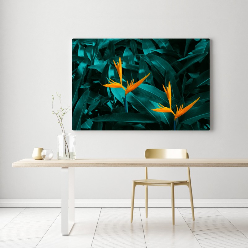 Obraz na płótnie tropikalna strelicja na turkusowych liściach