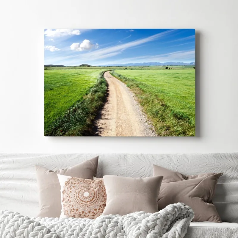 Obraz na płótnie wijąca się wiejska droga przez zielone łąki – Wallissimo® Obraz na płótnie wijąca się wiejska droga przez zielone łąki – Wallissimo®