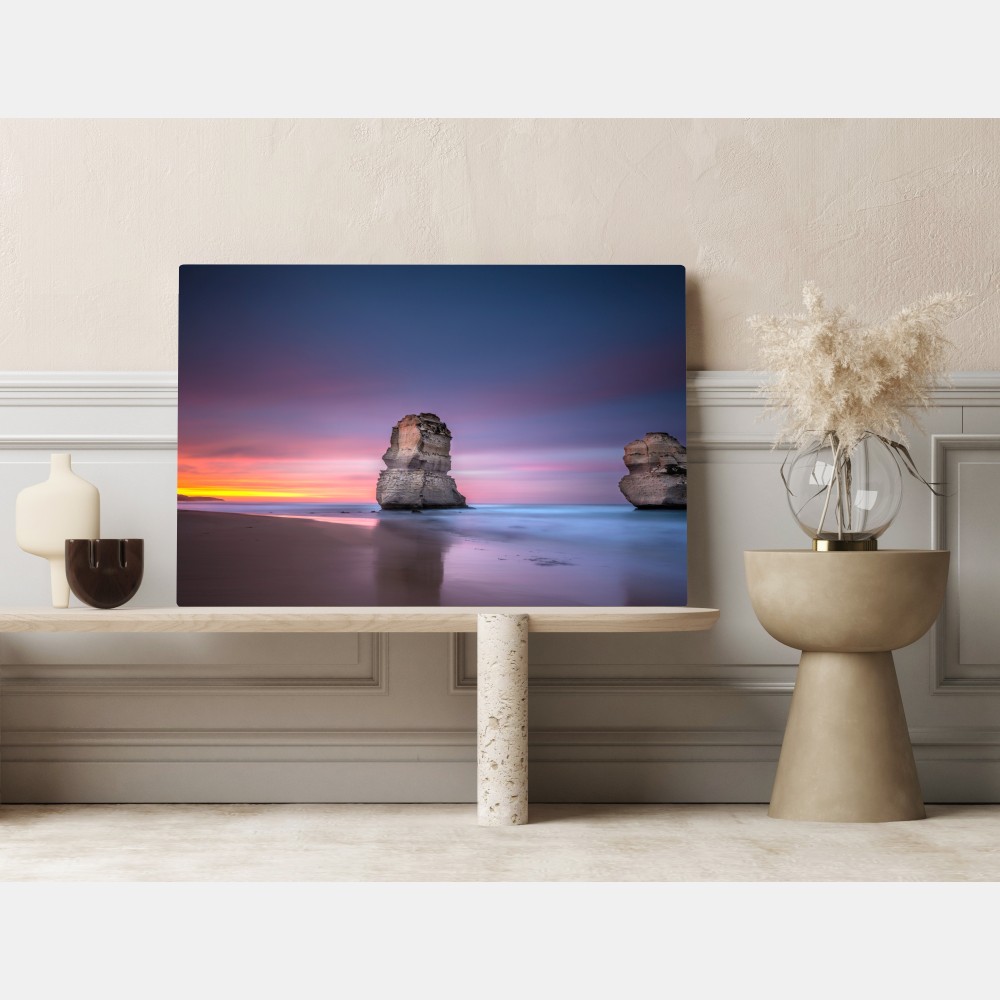 Obraz na płótnie spokojny morski pejzaż z formacjami skalnymi o zachodzie słońca – Wallissimo® Obraz na płótnie spokojny morski pejzaż z formacjami skalnymi o zachodzie słońca – Wallissimo®