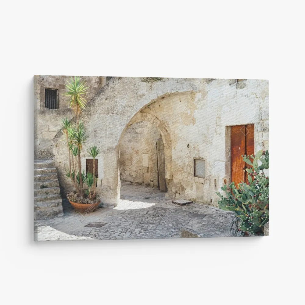Obraz na płótnie śródziemnomorski kamienny dziedziniec z łukiem – Wallissimo® Obraz na płótnie śródziemnomorski kamienny dziedziniec z łukiem – Wallissimo®