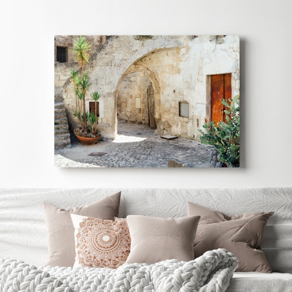 Obraz na płótnie śródziemnomorski kamienny dziedziniec z łukiem – Wallissimo® Obraz na płótnie śródziemnomorski kamienny dziedziniec z łukiem – Wallissimo®