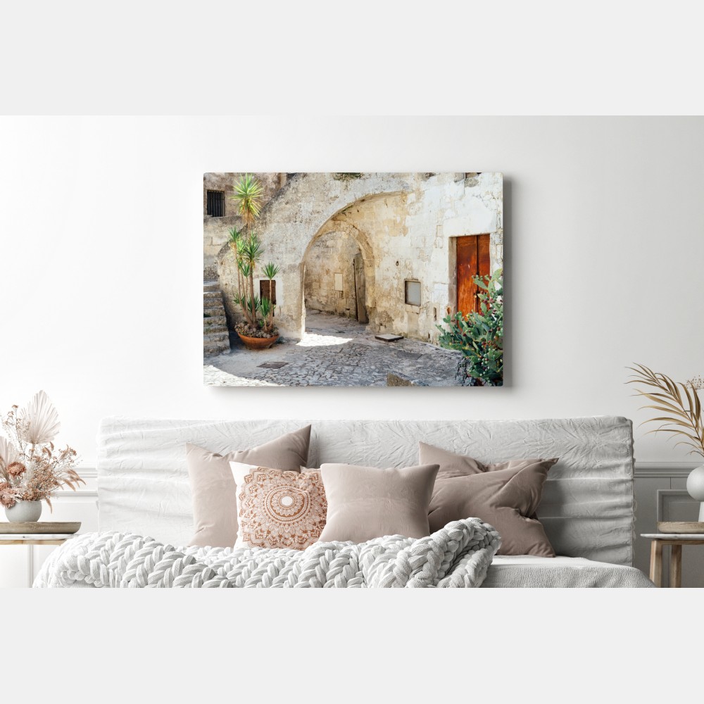 Obraz na płótnie śródziemnomorski kamienny dziedziniec z łukiem – Wallissimo® Obraz na płótnie śródziemnomorski kamienny dziedziniec z łukiem – Wallissimo®