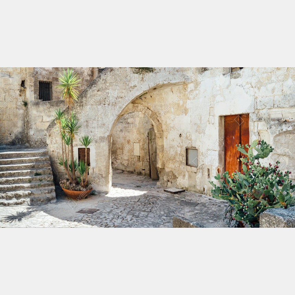 Obraz na płótnie śródziemnomorski kamienny dziedziniec z łukiem – Wallissimo® Obraz na płótnie śródziemnomorski kamienny dziedziniec z łukiem – Wallissimo®