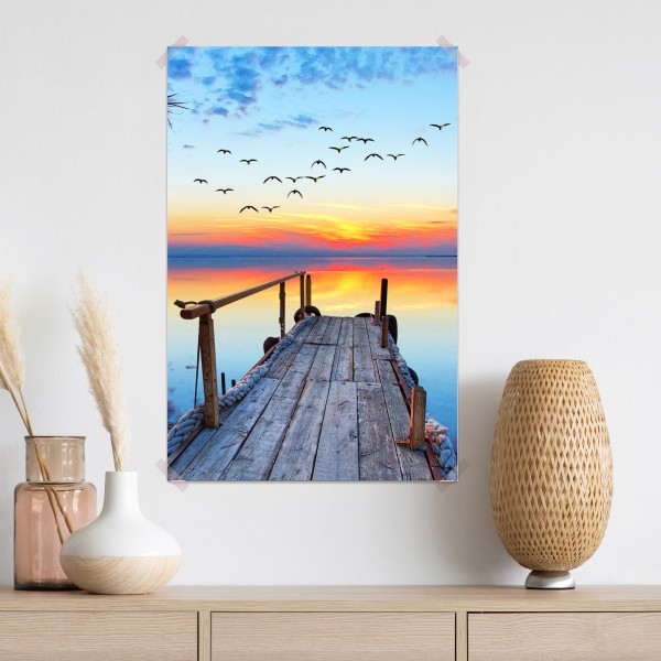 Plakat pomost o zachodzie słońca nad jeziorem